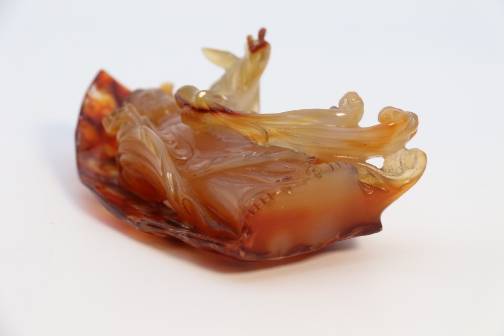 A very fine and rare Chinese hand carved agate hardstone figure of the goddess Guanyin. View XIII
