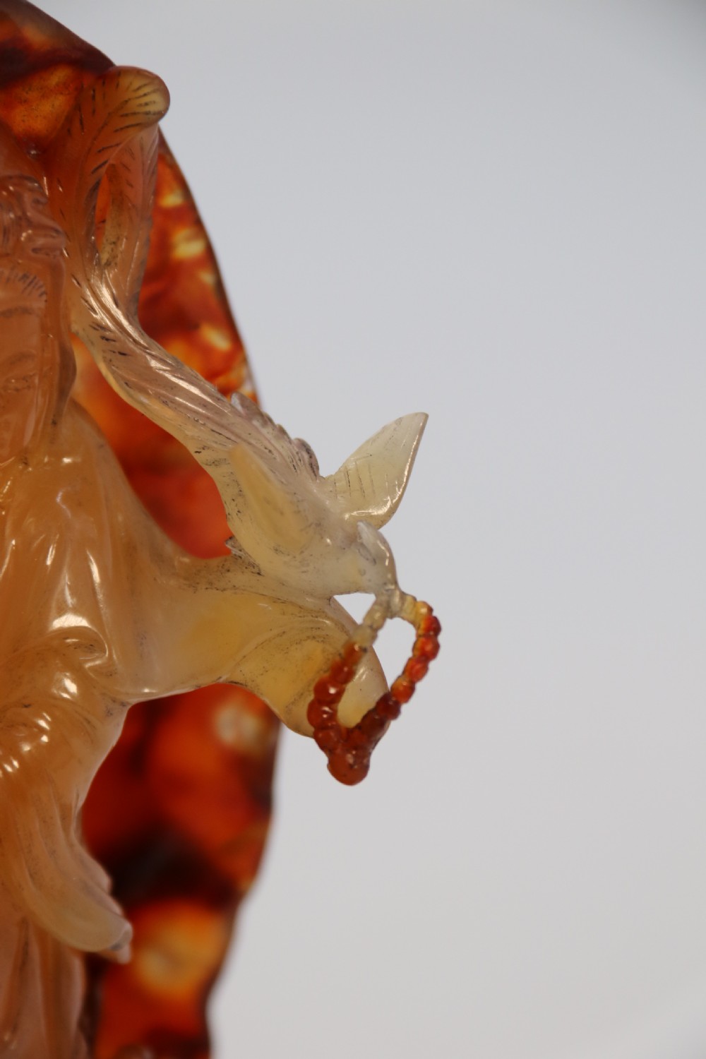A very fine and rare Chinese hand carved agate hardstone figure of the goddess Guanyin. View XVII