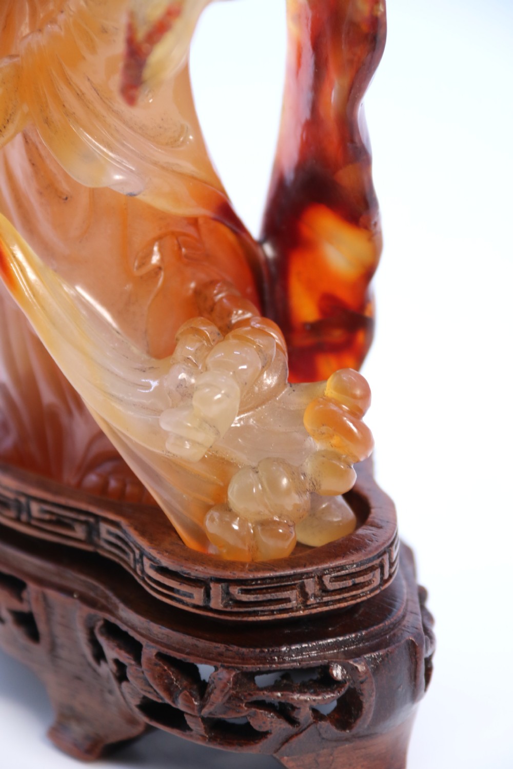 A very fine and rare Chinese hand carved agate hardstone figure of the goddess Guanyin. View XVIII