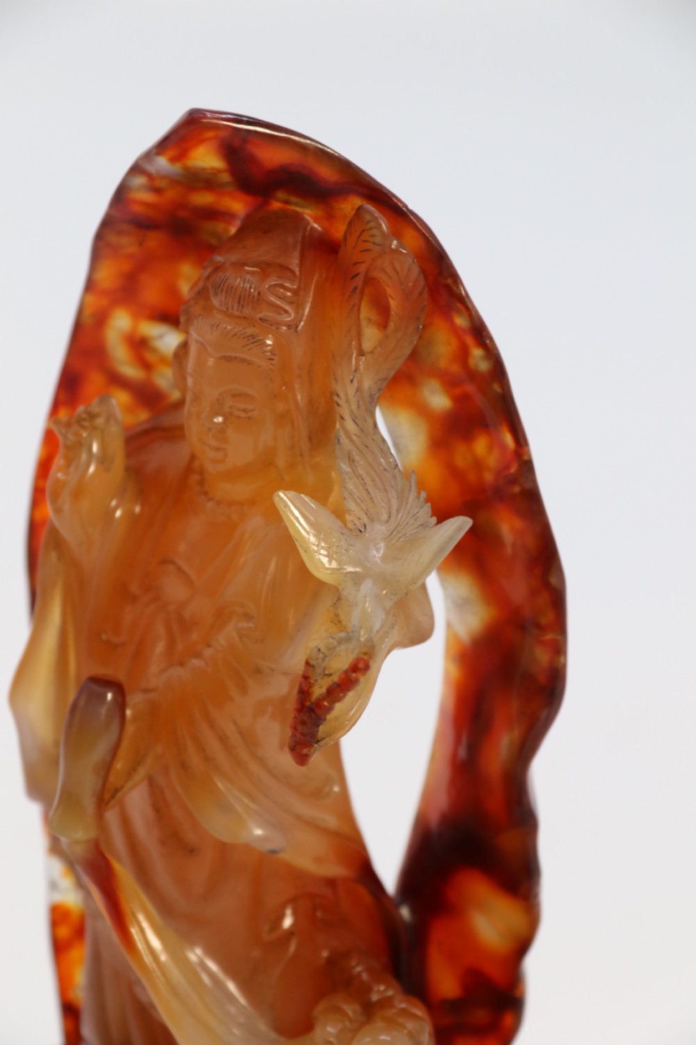 A very fine and rare Chinese hand carved agate hardstone figure of the goddess Guanyin. View XIX