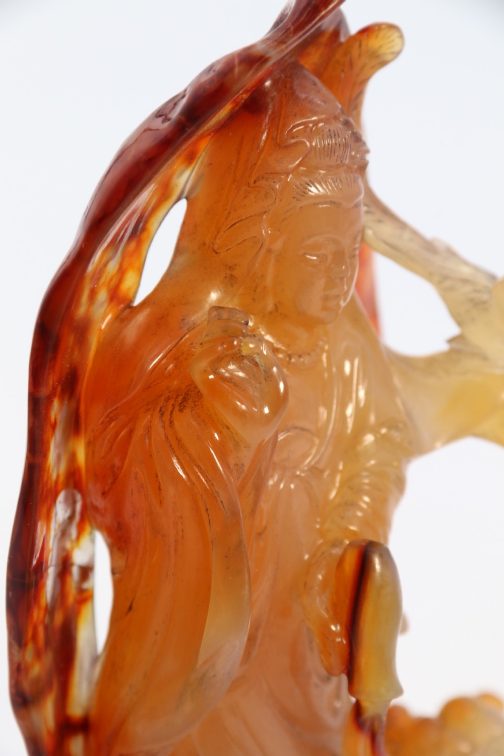 A very fine and rare Chinese hand carved agate hardstone figure of the goddess Guanyin. View XX