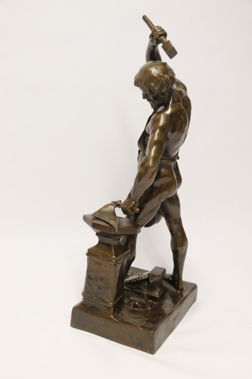A suburb late 19th C bronze study of a semi naked blacksmith by E. L Picault View III