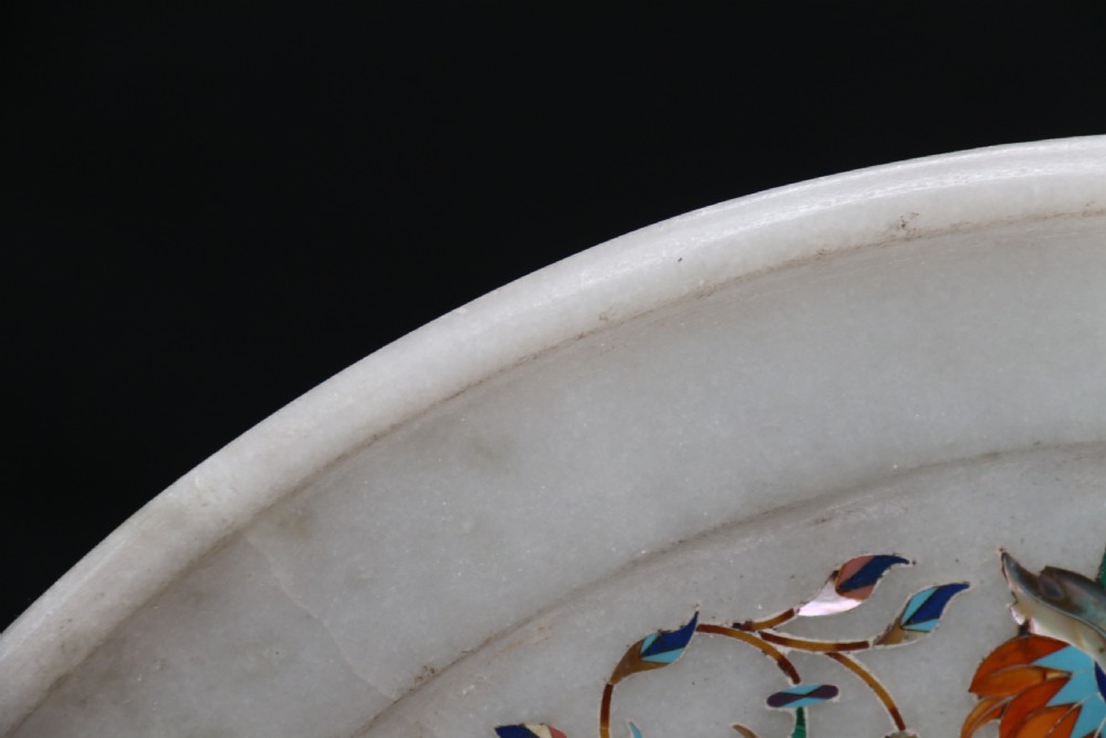 A rare and ultra-fine Raj period Indian white marble charger profusely inlaid with semi-precious cut stones. View VIII