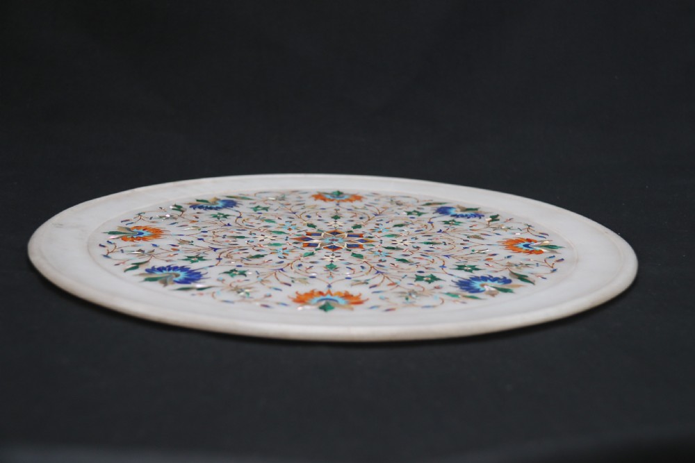 A rare and ultra-fine Raj period Indian white marble charger profusely inlaid with semi-precious cut stones. View XII