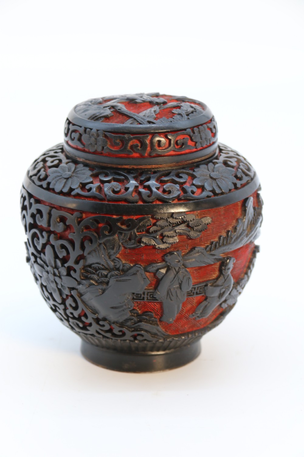 A fine Chinese carved cinnabar red and black lacquer jar and cover, circa 1920 View V