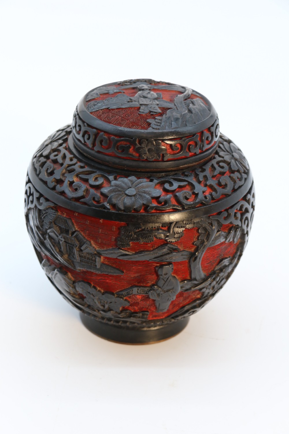 A fine Chinese carved cinnabar red and black lacquer jar and cover, circa 1920 View VII