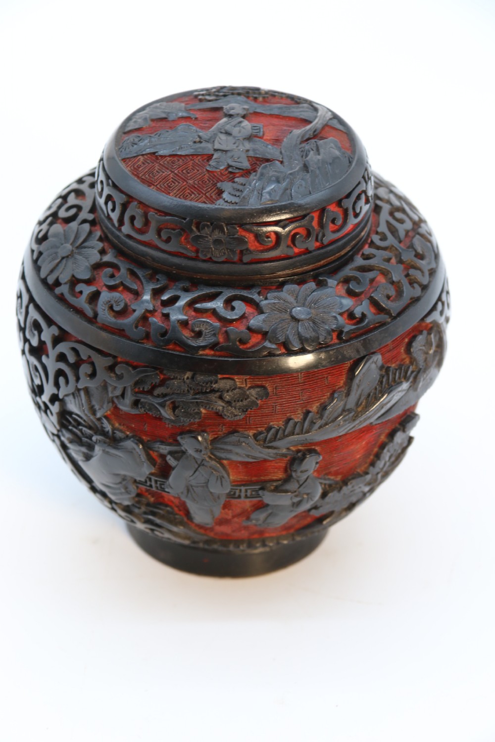 A fine Chinese carved cinnabar red and black lacquer jar and cover, circa 1920 View XI