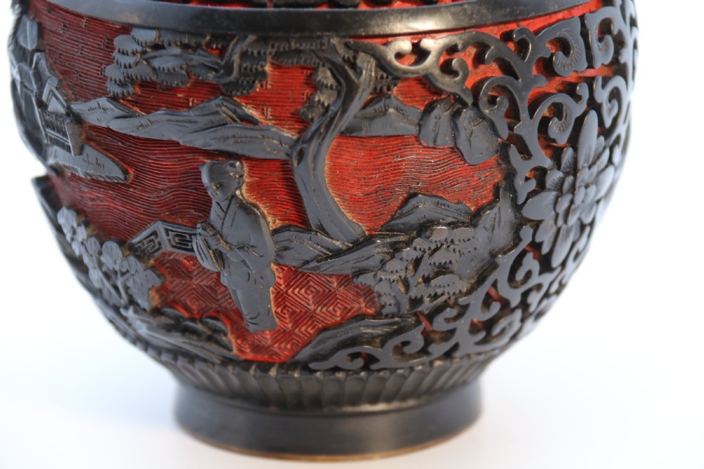 A fine Chinese carved cinnabar red and black lacquer jar and cover, circa 1920 View XX