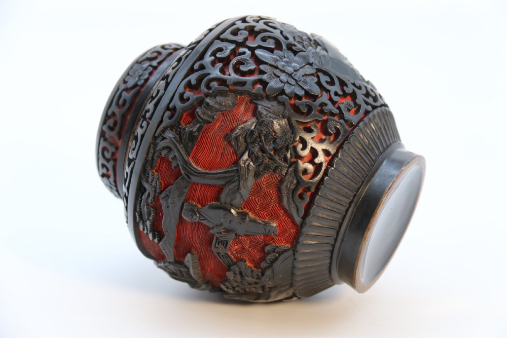 A fine Chinese carved cinnabar red and black lacquer jar and cover, circa 1920 View XXII