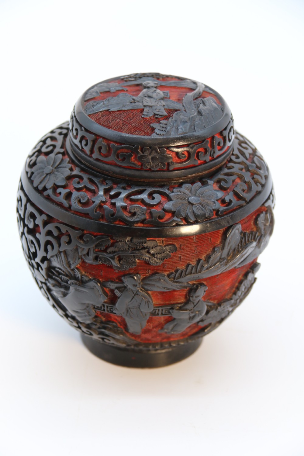 A fine Chinese carved cinnabar red and black lacquer jar and cover, circa 1920 View XXIV