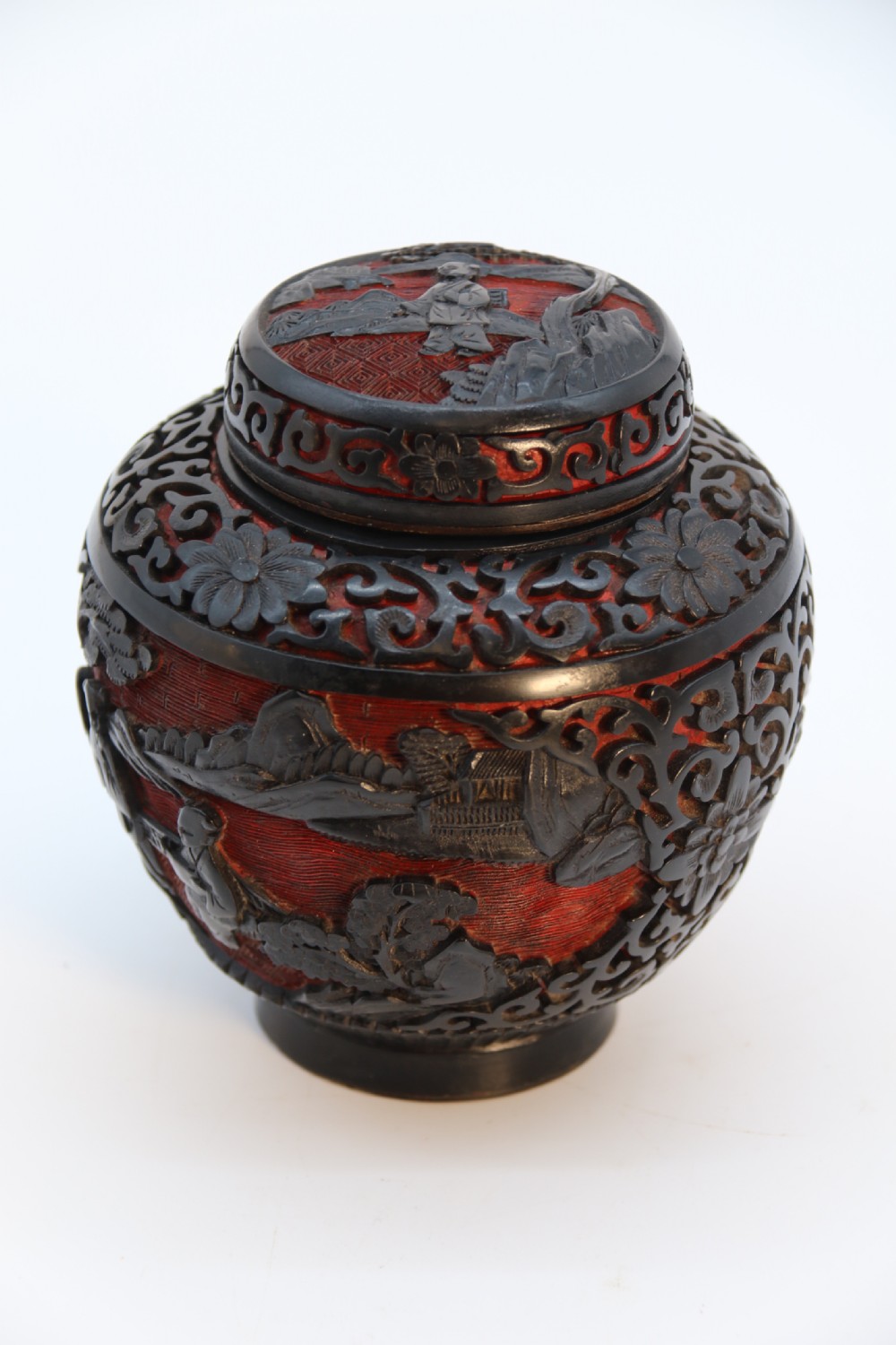 A fine Chinese carved cinnabar red and black lacquer jar and cover, circa 1920 View XXVI