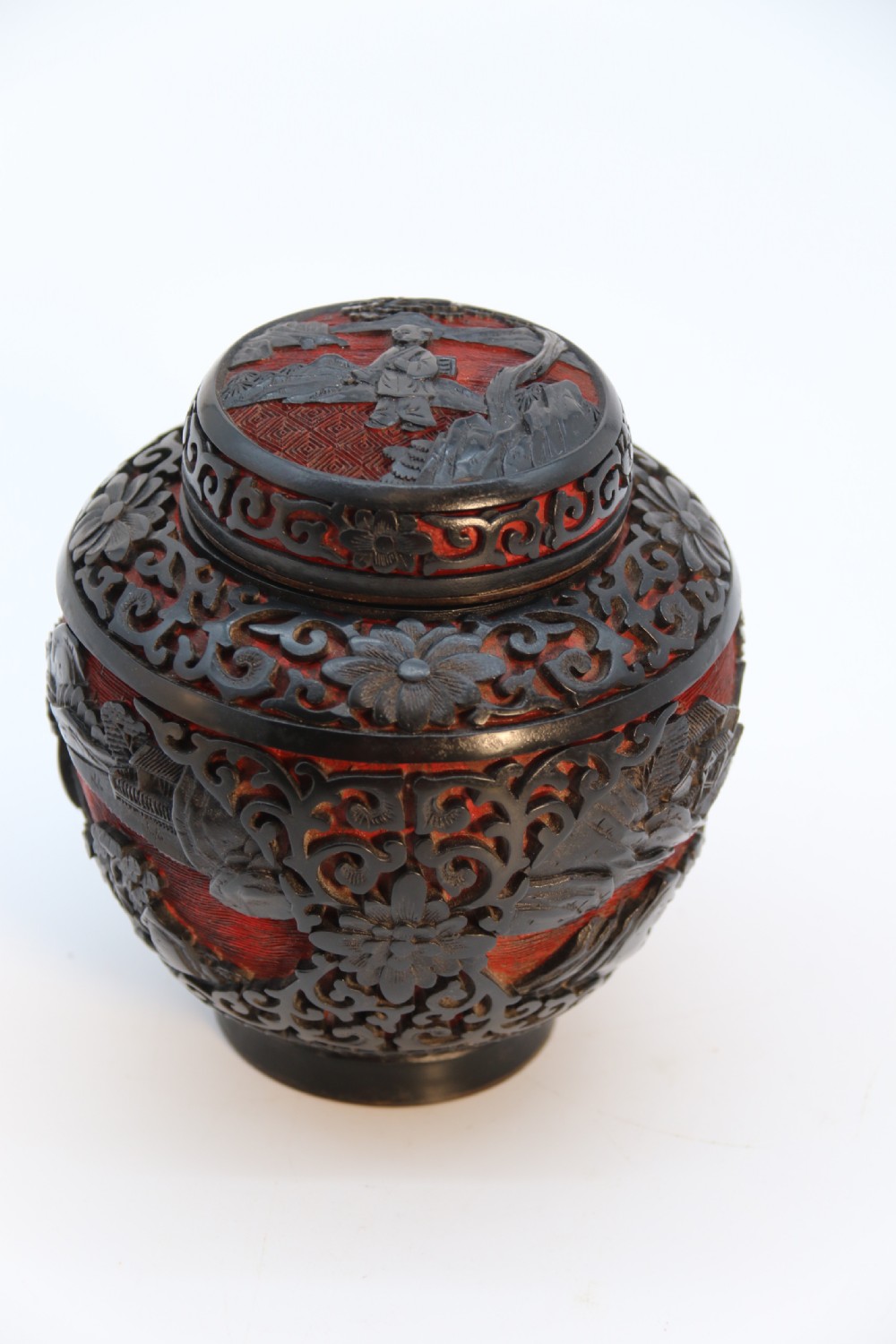 A fine Chinese carved cinnabar red and black lacquer jar and cover, circa 1920 View XXVII