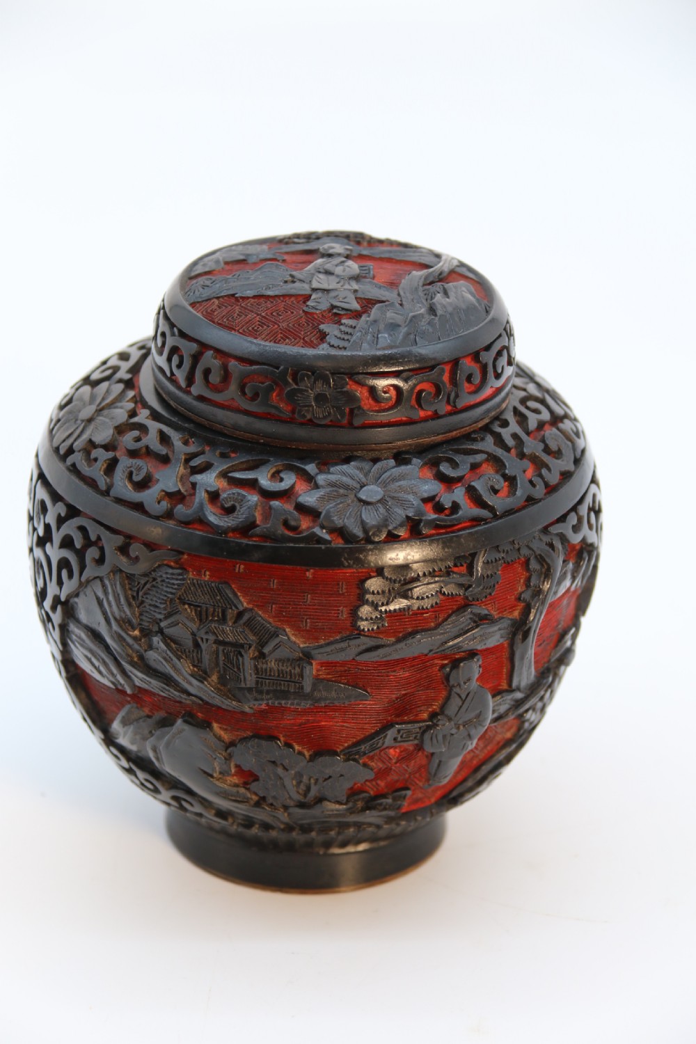 A fine Chinese carved cinnabar red and black lacquer jar and cover, circa 1920 View XXIX