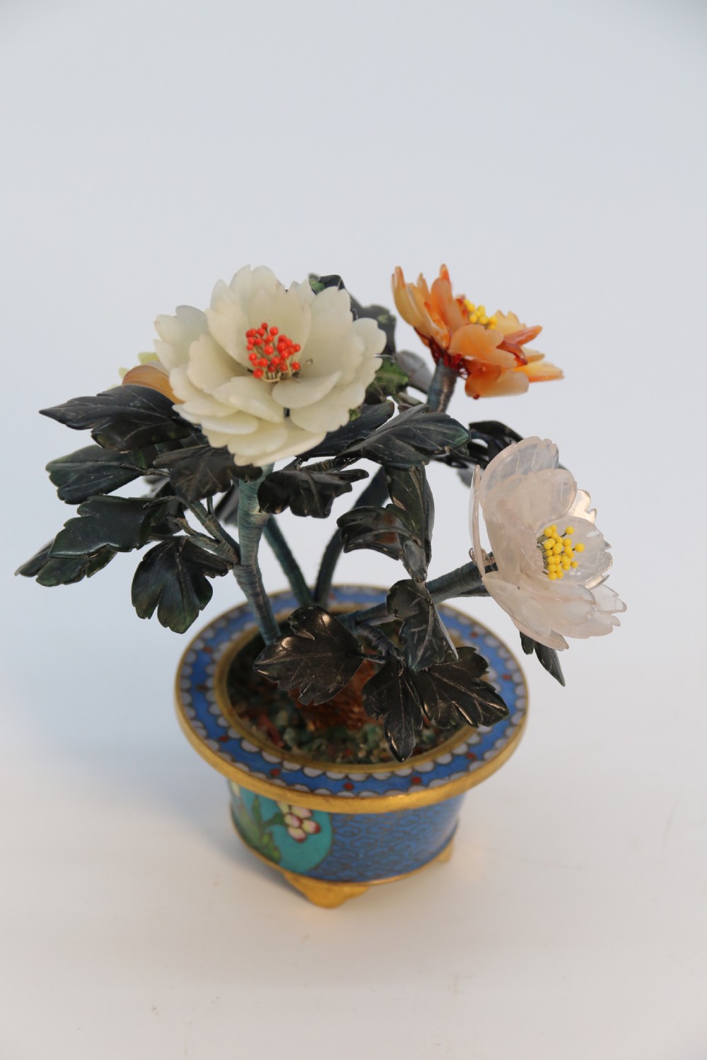 A very fine Chinese carved hardstone and cloisonne study of a flowering bonsai tree, circa 1920 View V