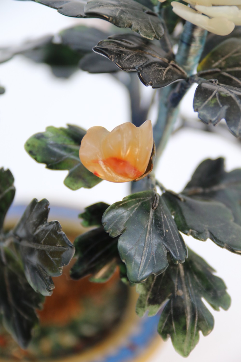 A very fine Chinese carved hardstone and cloisonne study of a flowering bonsai tree, circa 1920 View XIX