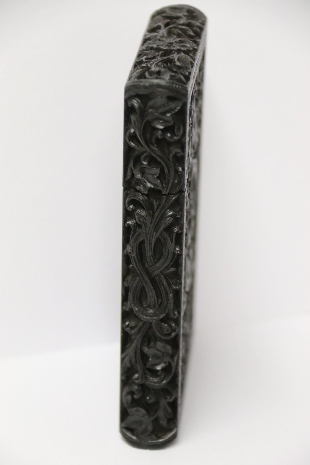 An exceptional Indian Raj period carved ebony calling card case, circa 1860 View V