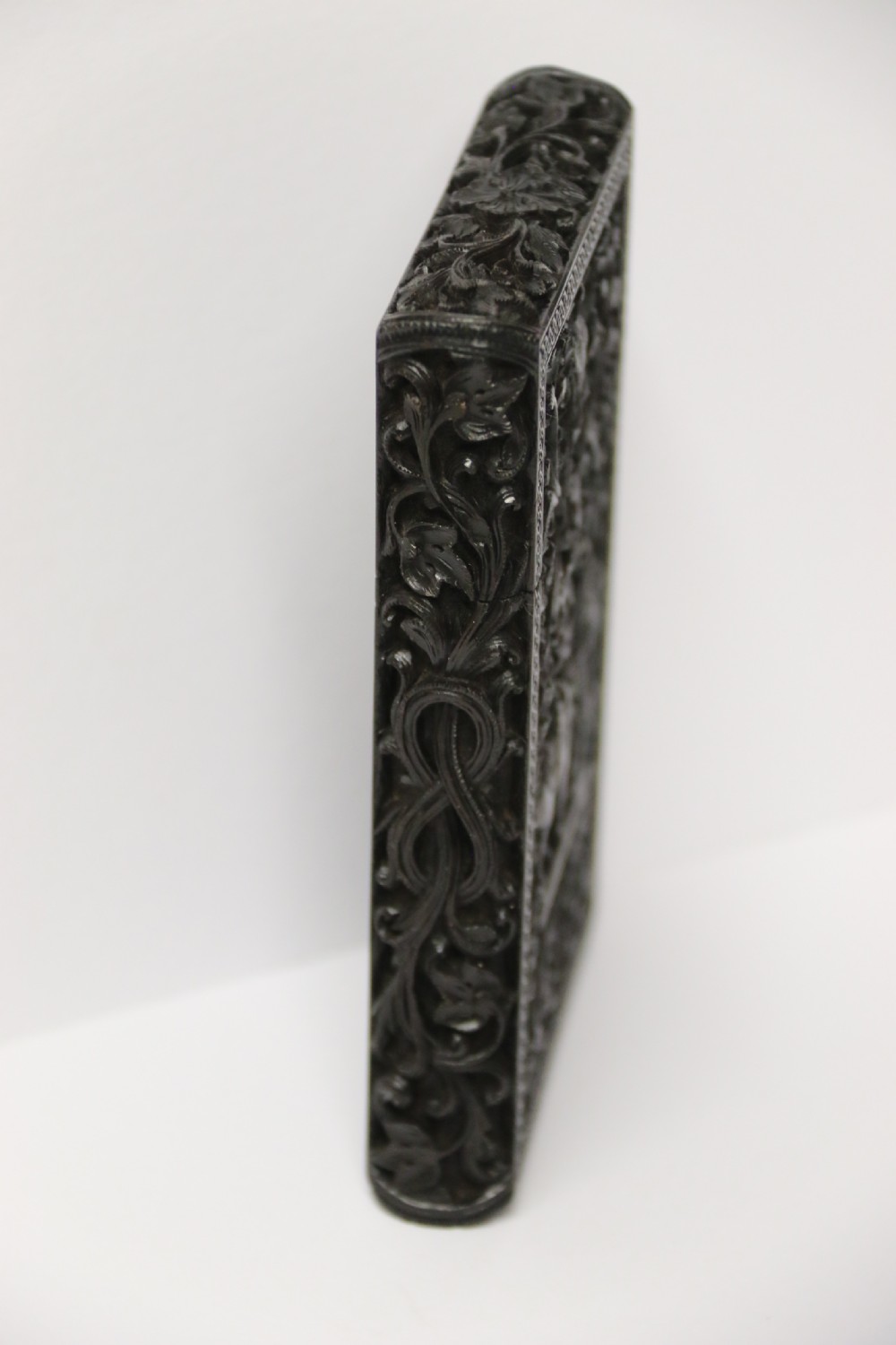 An exceptional Indian Raj period carved ebony calling card case, circa 1860 View VI