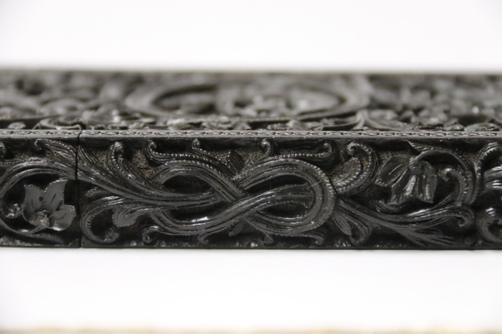 An exceptional Indian Raj period carved ebony calling card case, circa 1860 View XX