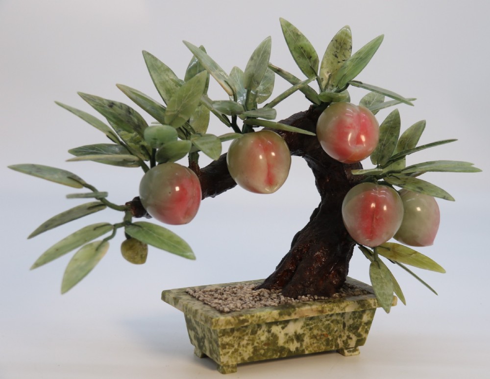 A rare Chinese large hardstone study of a fruiting peach bonsai tree, circa1930

