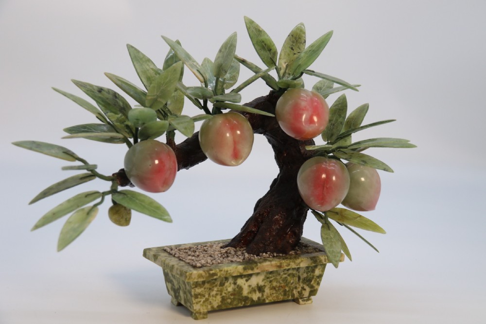 A rare Chinese large hardstone study of a fruiting peach bonsai tree, circa1930

 View IV