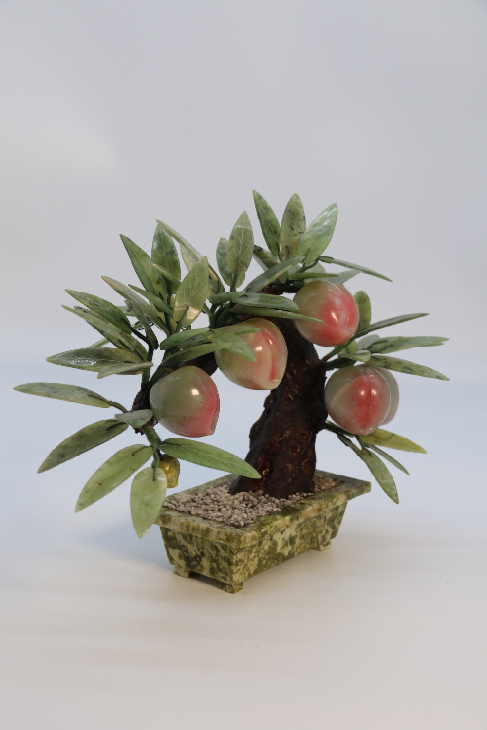 A rare Chinese large hardstone study of a fruiting peach bonsai tree, circa1930

 View VI