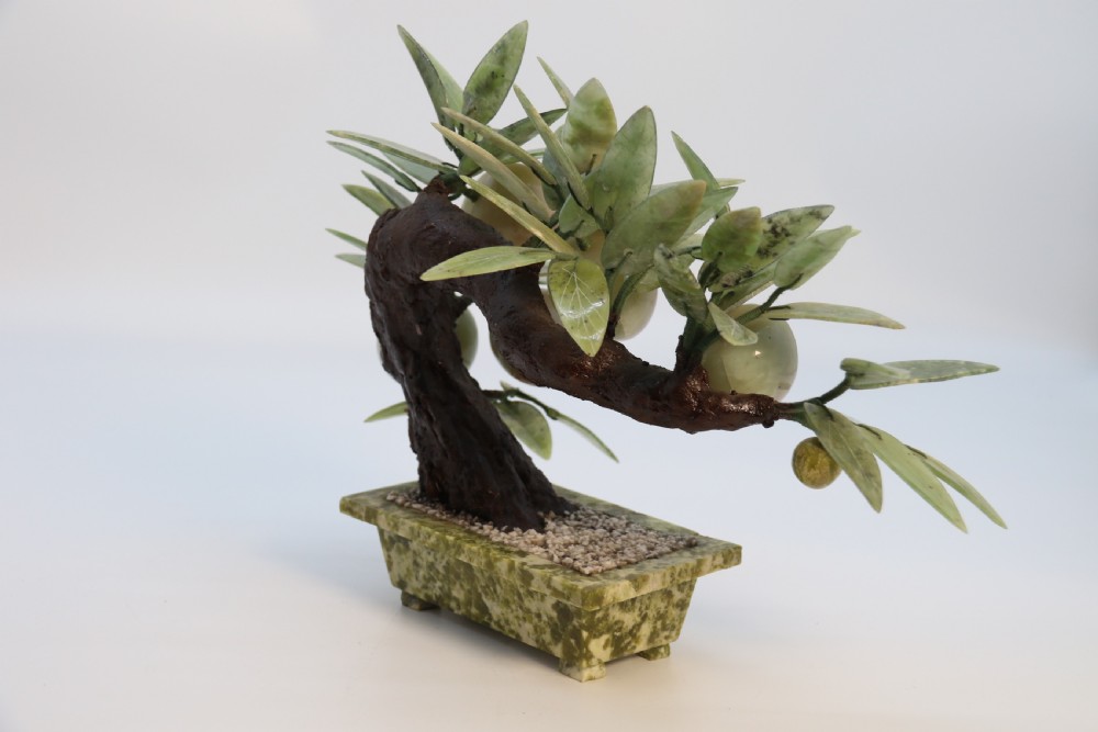 A rare Chinese large hardstone study of a fruiting peach bonsai tree, circa1930

 View VIII