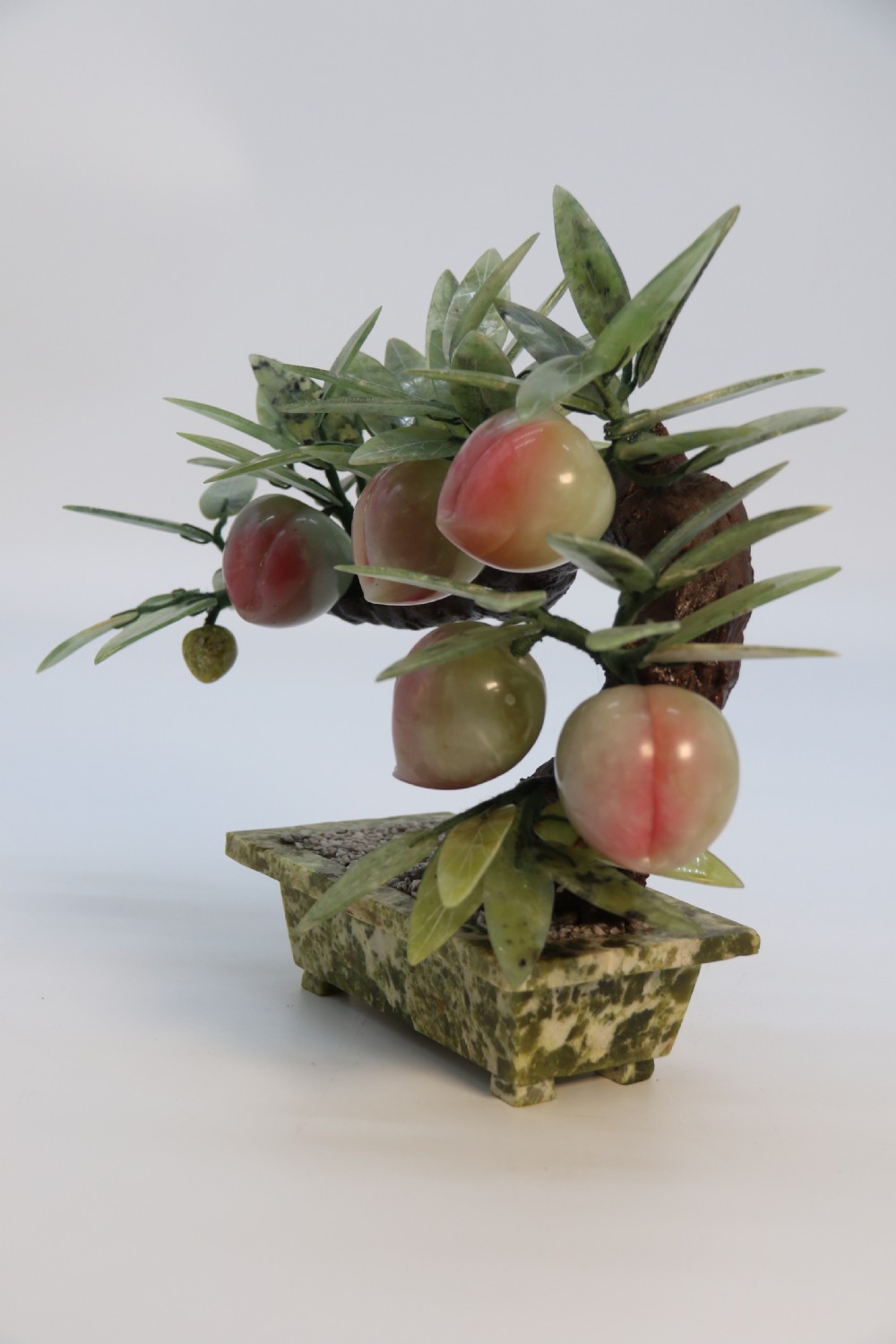 A rare Chinese large hardstone study of a fruiting peach bonsai tree, circa1930

 View XI