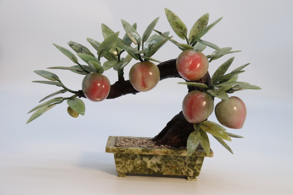 A rare Chinese large hardstone study of a fruiting peach bonsai tree, circa1930

 View XII
