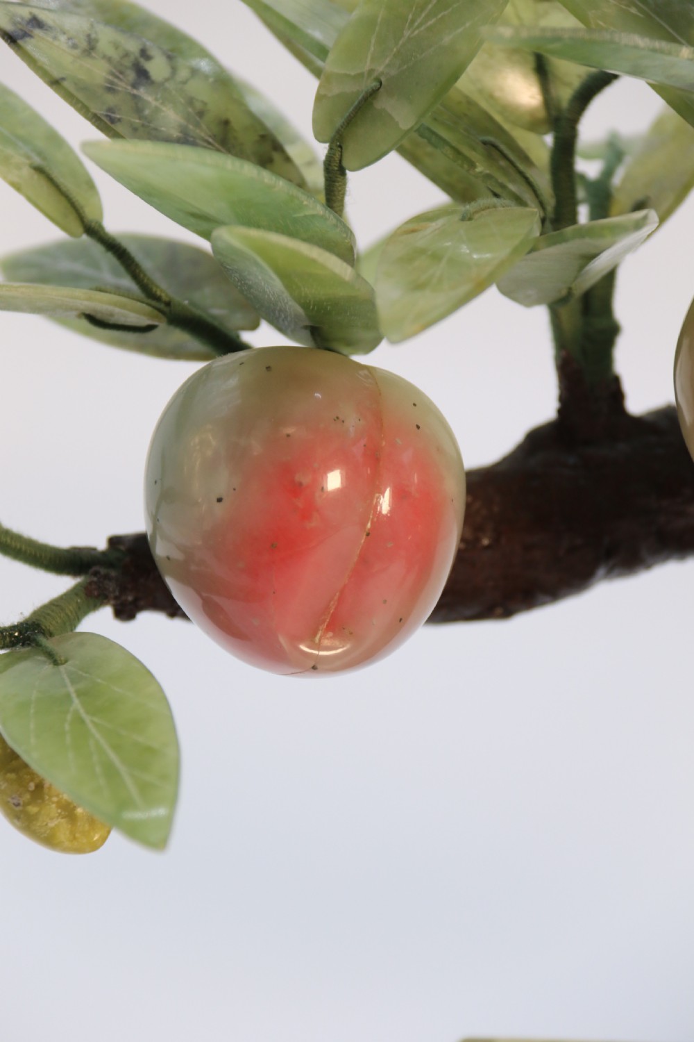 A rare Chinese large hardstone study of a fruiting peach bonsai tree, circa1930

 View XV