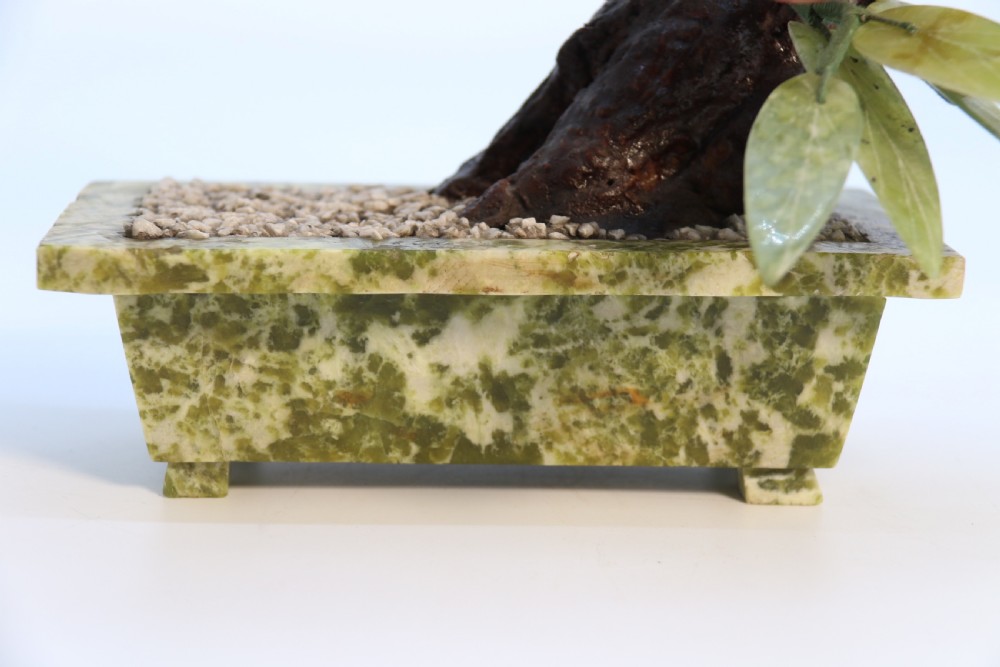 A rare Chinese large hardstone study of a fruiting peach bonsai tree, circa1930

 View XVI