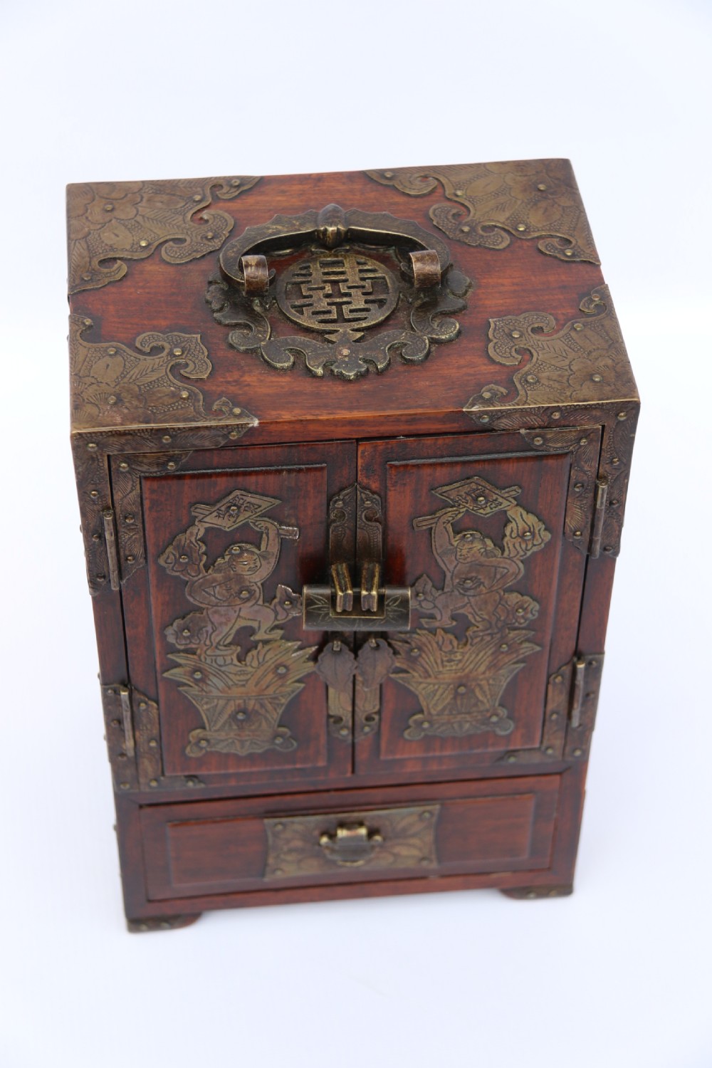 A rare Chinese hardwood and engraved bronze mounted small cabinet with a makers stamp. View XI