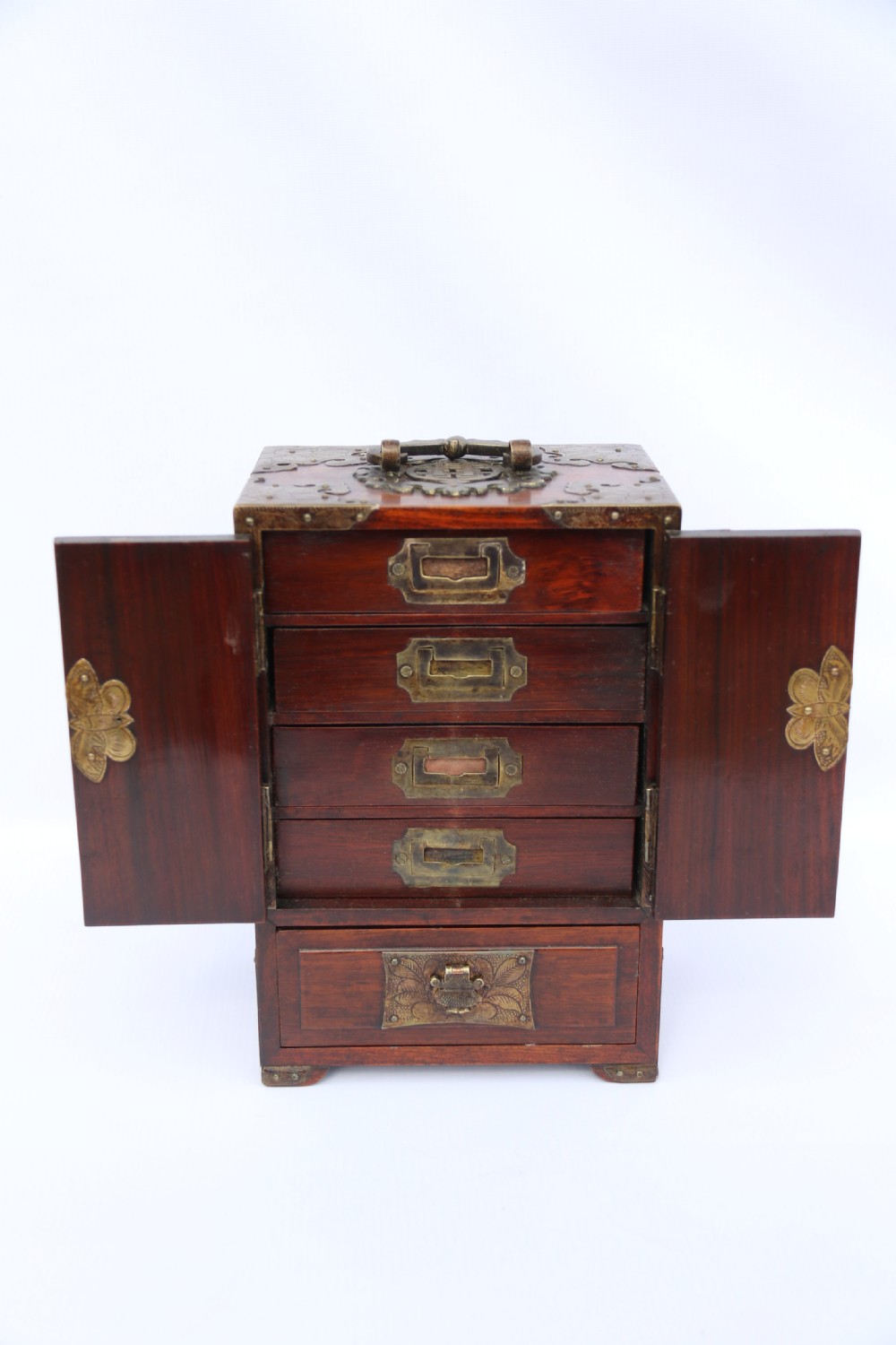 A rare Chinese hardwood and engraved bronze mounted small cabinet with a makers stamp. View XII