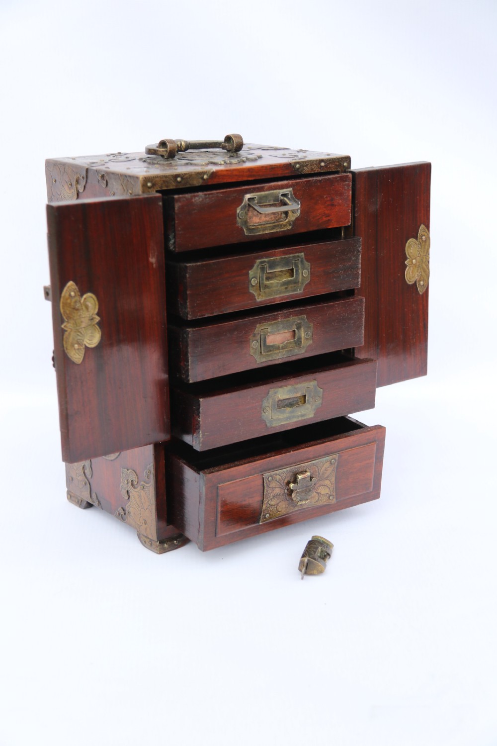 A rare Chinese hardwood and engraved bronze mounted small cabinet with a makers stamp. View XIV