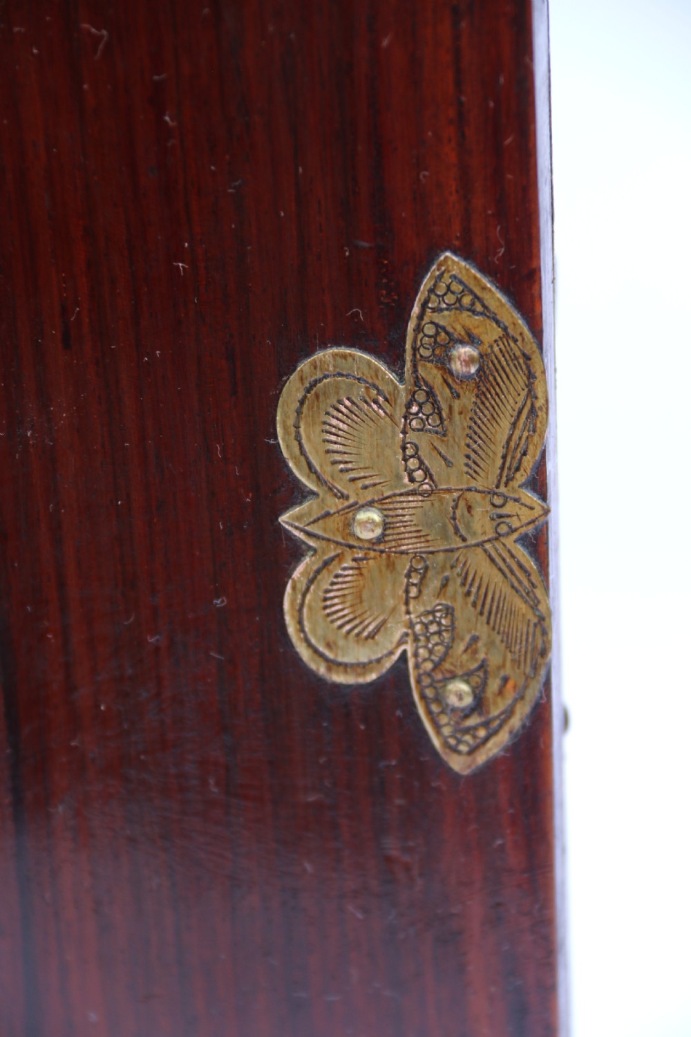 A rare Chinese hardwood and engraved bronze mounted small cabinet with a makers stamp. View XVIII