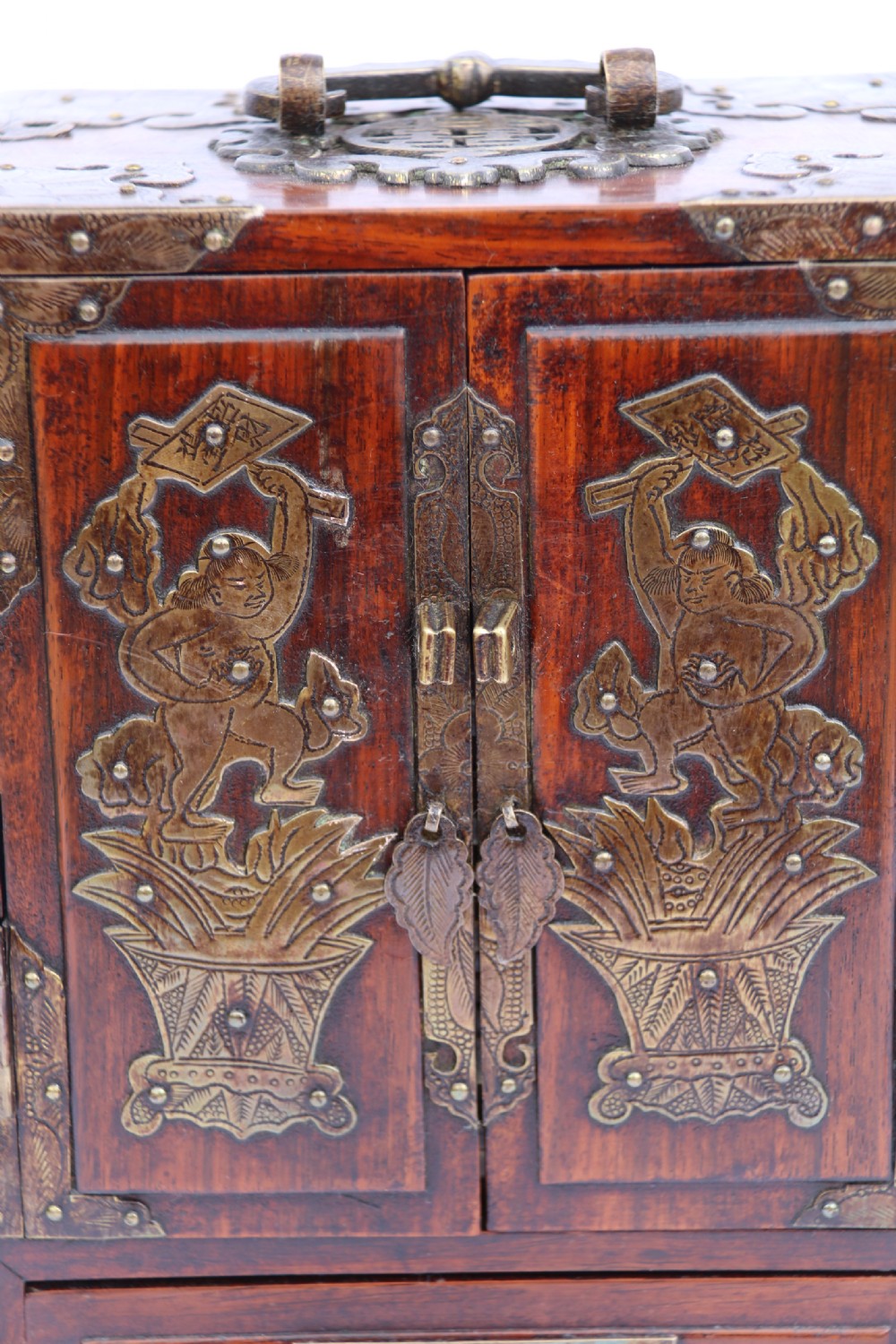 A rare Chinese hardwood and engraved bronze mounted small cabinet with a makers stamp. View XXI