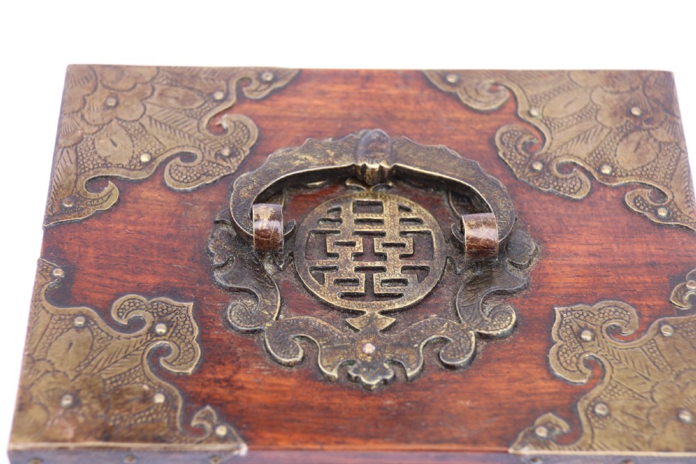 A rare Chinese hardwood and engraved bronze mounted small cabinet with a makers stamp. View XXVII