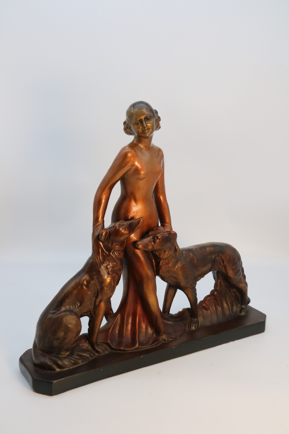 An elegant art deco plaster and cold painted figure group, circa 1930 View III