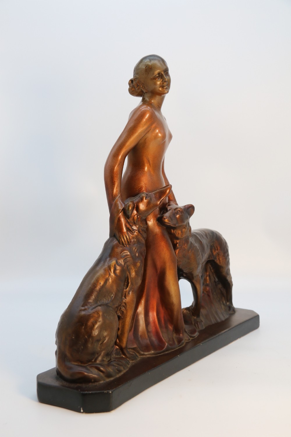 An elegant art deco plaster and cold painted figure group, circa 1930 View V