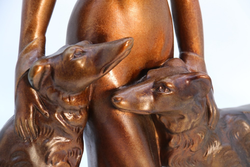 An elegant art deco plaster and cold painted figure group, circa 1930 View XV