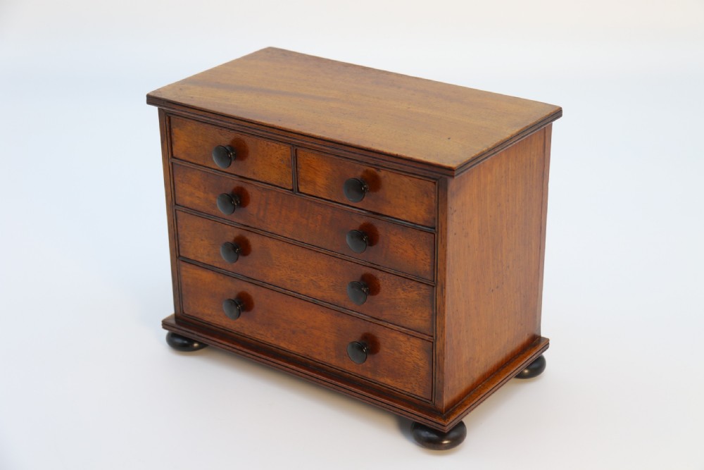A superb mid Victorian miniature apprentice piece chest of drawers, circa 1860 View VI