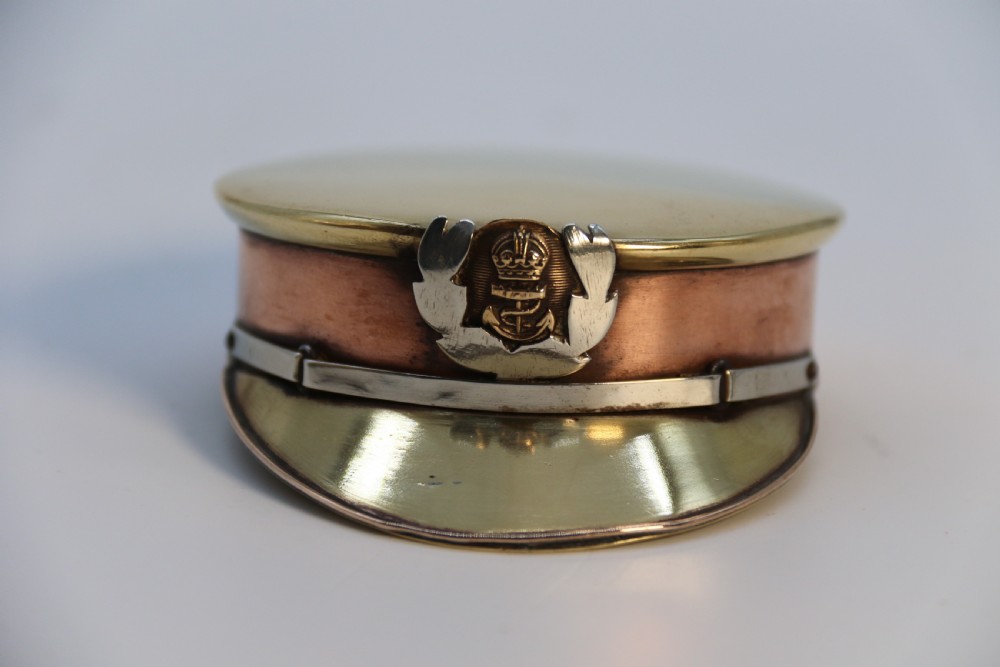 A rare novelty pocket snuff box in the form of an English naval officers peaked cap. View II