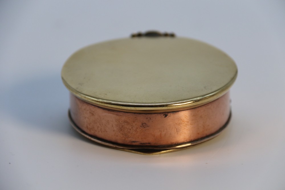 A rare novelty pocket snuff box in the form of an English naval officers peaked cap. View VI