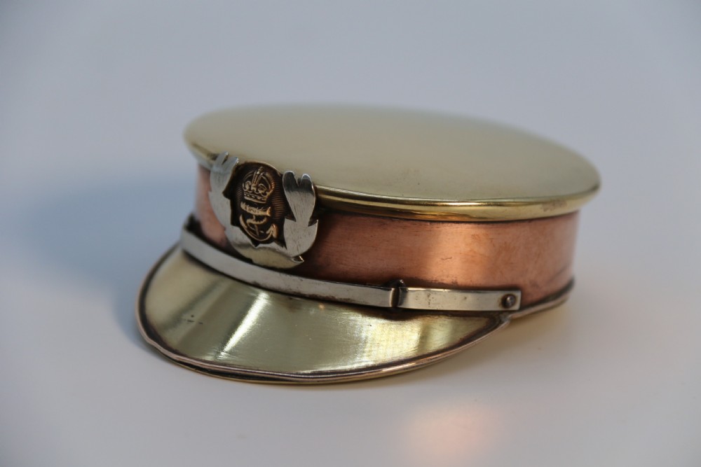 A rare novelty pocket snuff box in the form of an English naval officers peaked cap. View VII