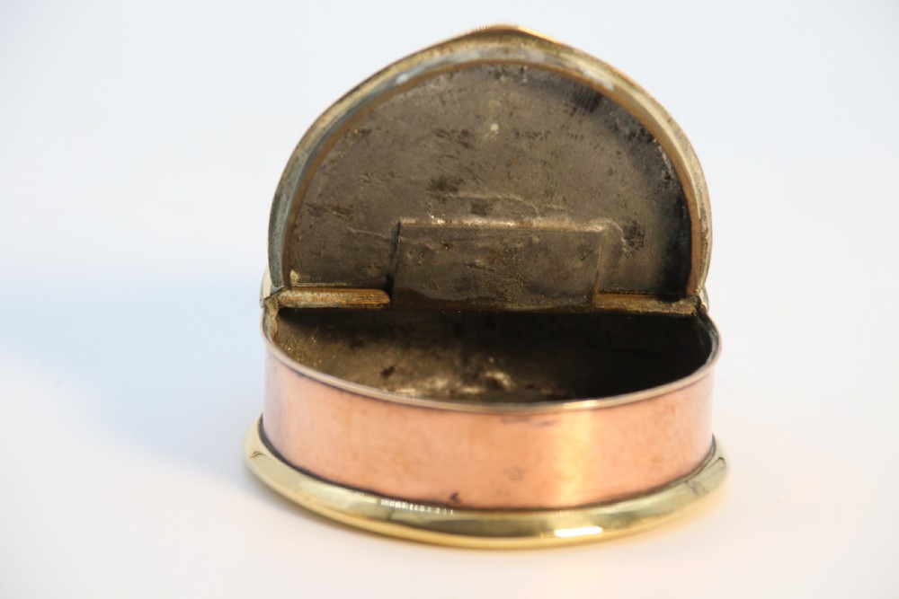 A rare novelty pocket snuff box in the form of an English naval officers peaked cap. View IX