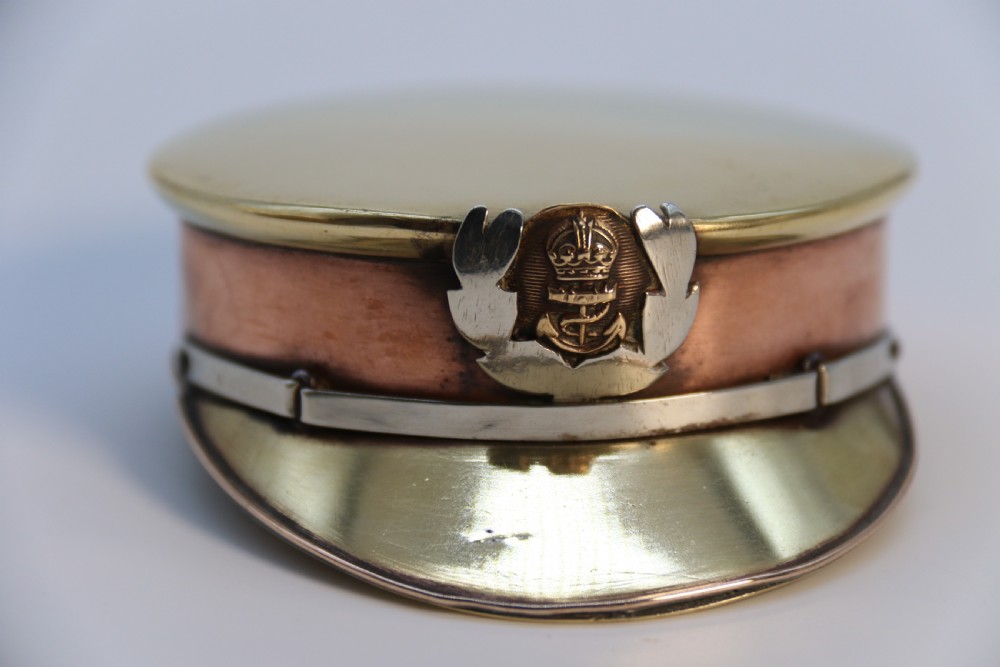 A rare novelty pocket snuff box in the form of an English naval officers peaked cap. View XII