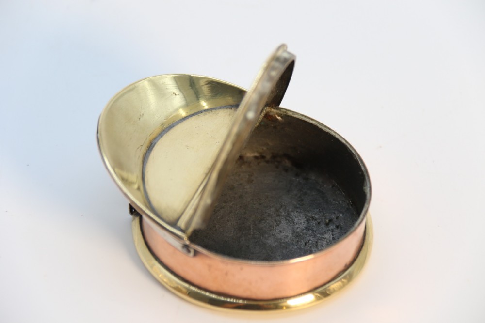 A rare novelty pocket snuff box in the form of an English naval officers peaked cap. View XIV
