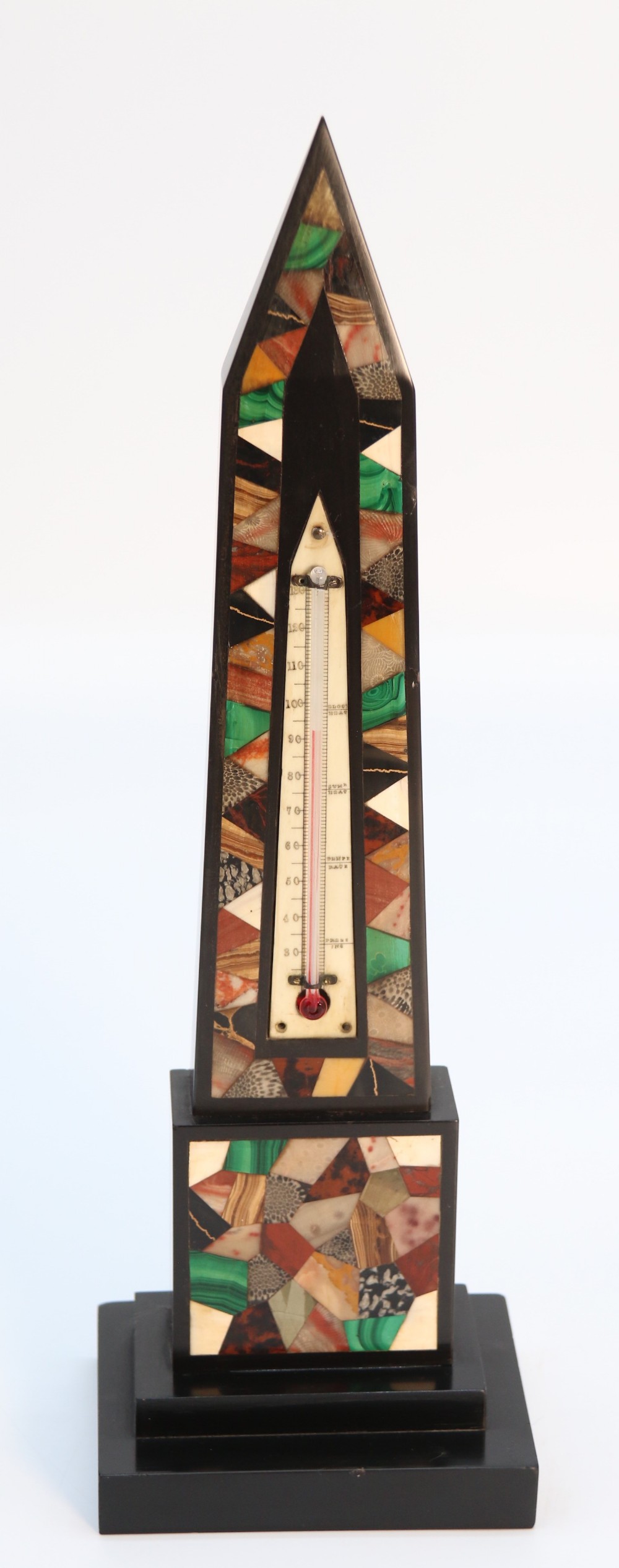 A fine 19th century Derbyshire black slate and specimen marbles obelisk with thermometer

