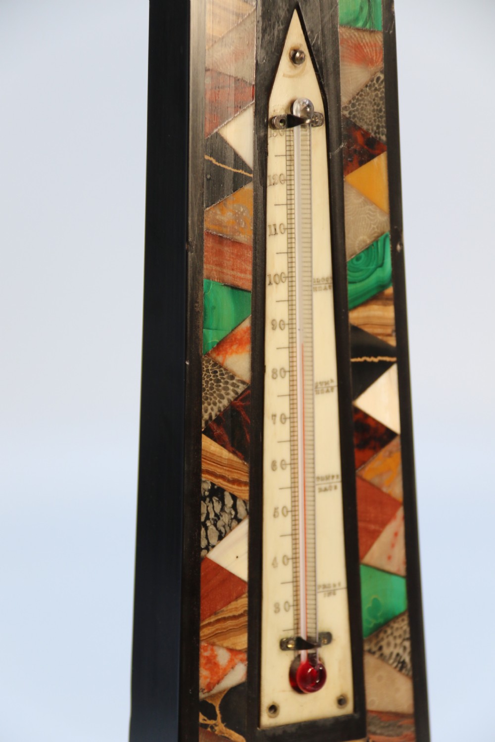A fine 19th century Derbyshire black slate and specimen marbles obelisk with thermometer

 View XII