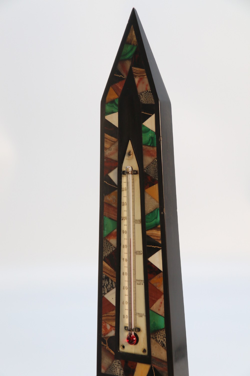A fine 19th century Derbyshire black slate and specimen marbles obelisk with thermometer

 View XIII