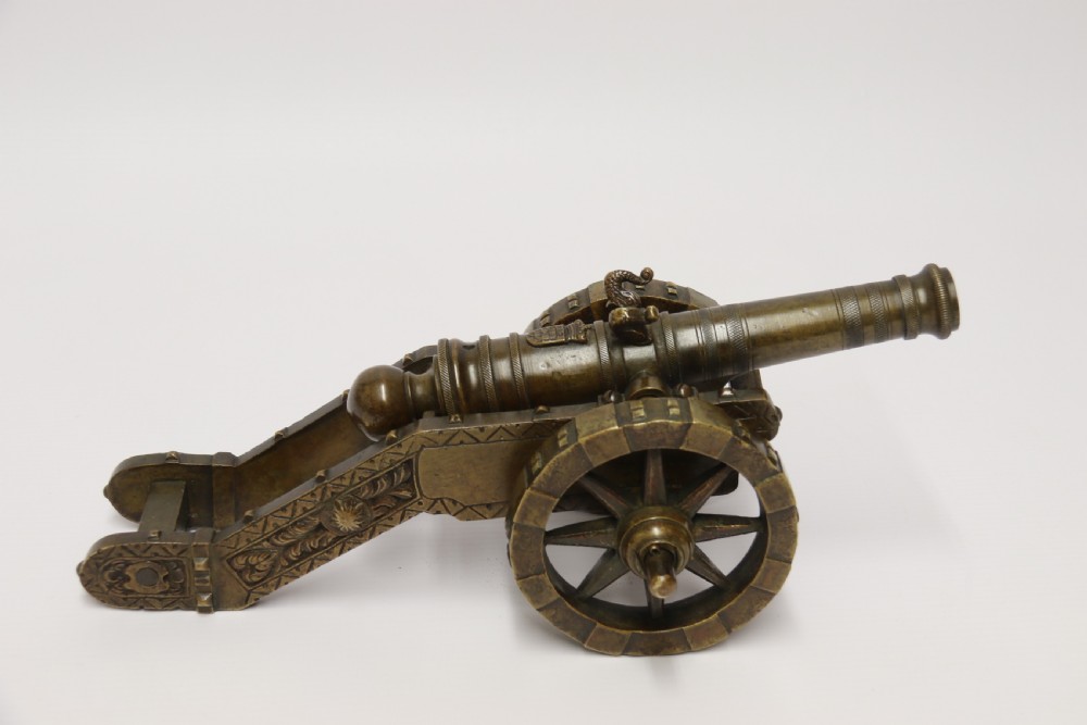 A 19th century French bronze model cannon. View IV